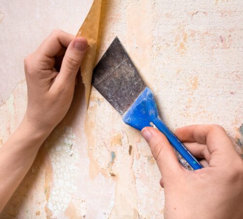 the removal of wallpaper in a home